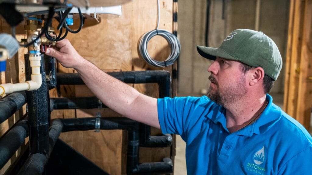 Intown Plumbing technician explaining how to fix a water heater leaking from the bottom. 
