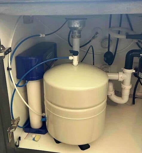 When asking the question "what does a gas leak smell like in a house," residents in the Rockwall, Dallas-Fort Worth area should first check this under-sink plumbing trap for foul sewer odors.