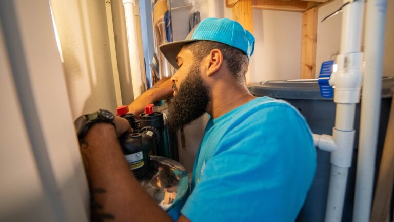 Intown Plumbing technician performing a water line test to check for water line leaks.