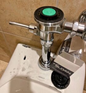 Sloan flushometer diaphragm vacuum breaker replacement commercial restroom Terrell TX